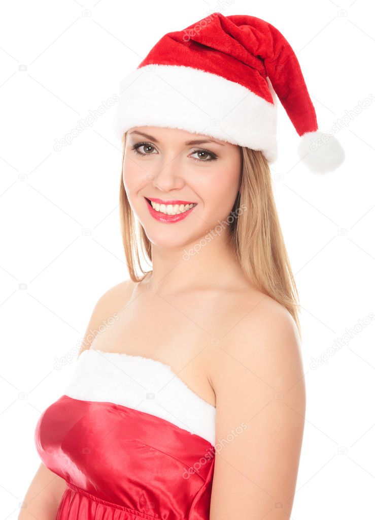 Beautiful young woman in red wearing santa hat. Isolated on whit