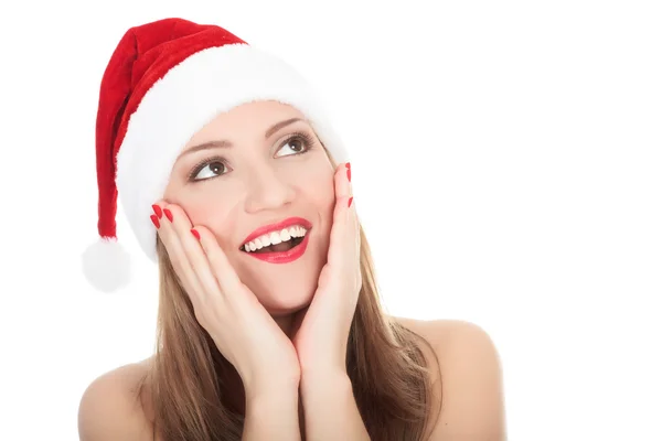 Beautiful young woman wearing santa hat Stock Picture