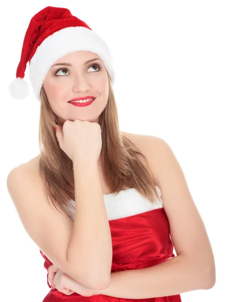 Foto van mooi Kerstmis meisje in een rode jurk en santa hoed — Stockfoto