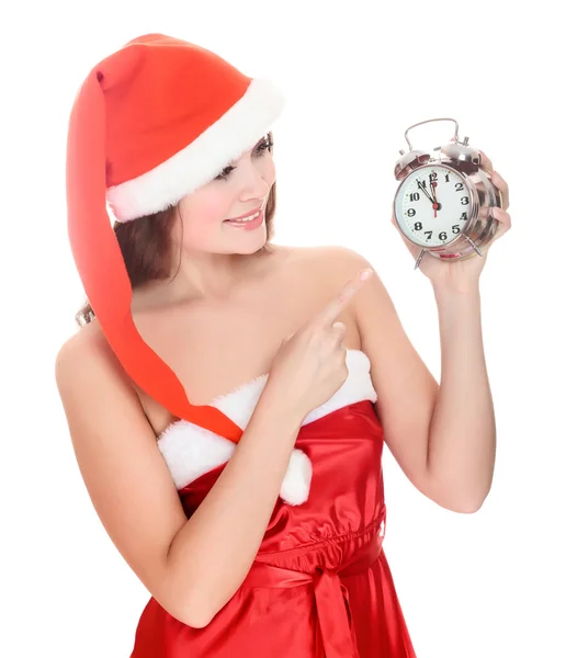 Chica de Navidad en vestido rojo y sombrero de santa con despertador —  Fotos de Stock