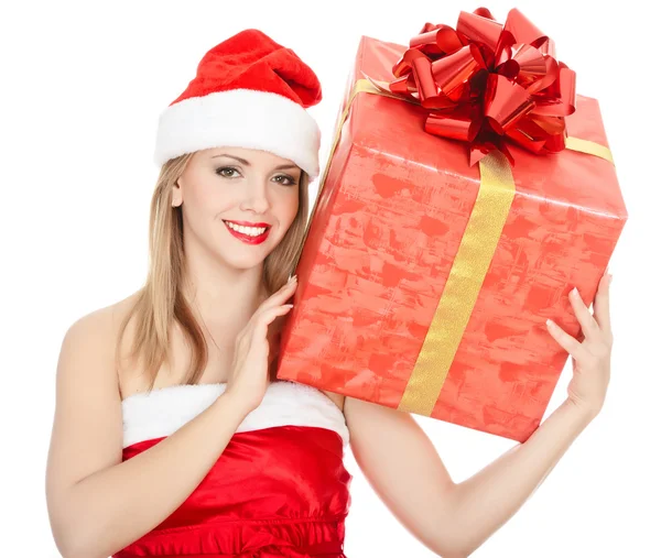 Cheerful santa helper girl with big gift box. Stock Photo