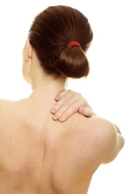 Woman from behind, naked body, holding her neck on the right sid clipart