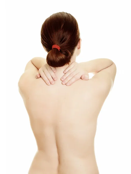 Жінка масажує біль назад ізольовано на білому тлі — стокове фото