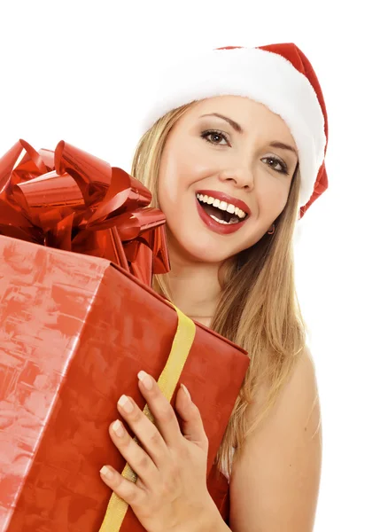 Glad santa helper tjej med stora presentförpackning Stockbild