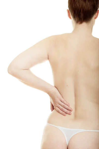 Kvinna masserande smärta tillbaka — Stockfoto