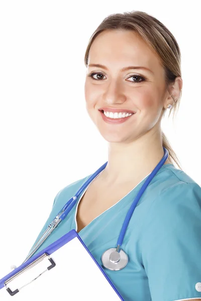 Doctor holding a clipboard against white background — Stock Photo, Image