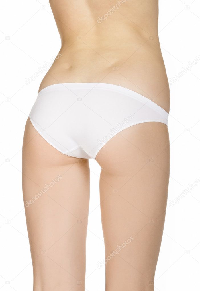 Beautiful slim female body in underwear, isolated on white backg