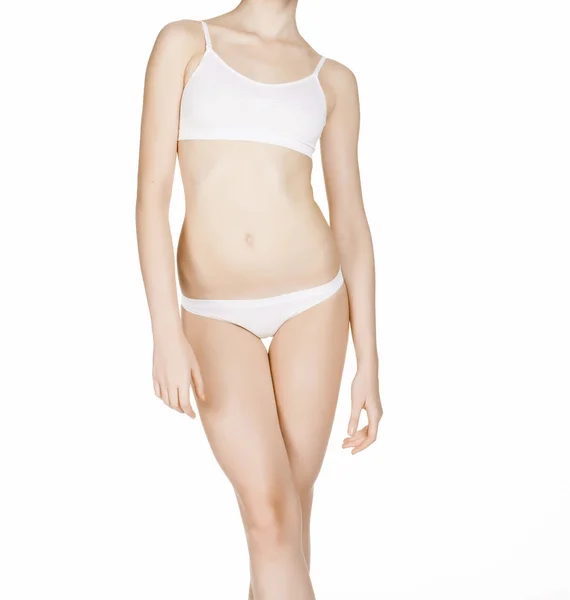 Красивое стройное женское тело в нижнем белье, изолированное на белом спинке — стоковое фото