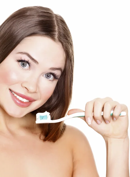 Bella ragazza spazzolando i denti — Foto Stock