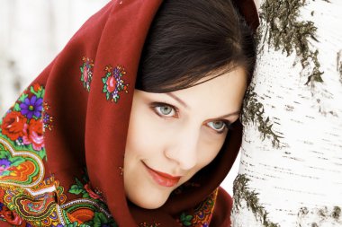 Gorgeous woman in shawl. clipart