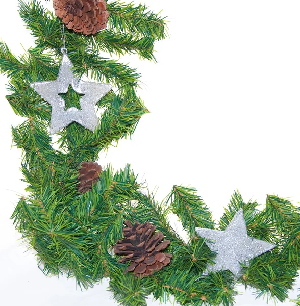 Spruce branches with Christmas balls on white — Stock Photo, Image
