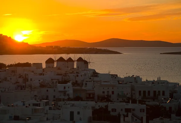 Top view of the town of Mykonos with windmills at sunset — Stock Photo, Image