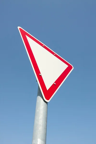 Sign against blue sky — Stock Photo, Image