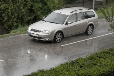 Car in rain clipart