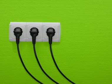 Electric outlets with cables connected clipart