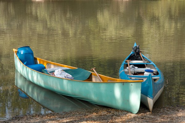 Canoes of a rowing river tour