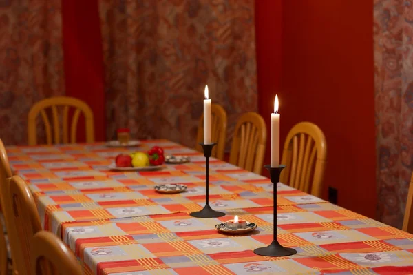 stock image Big dining table with soft candle light