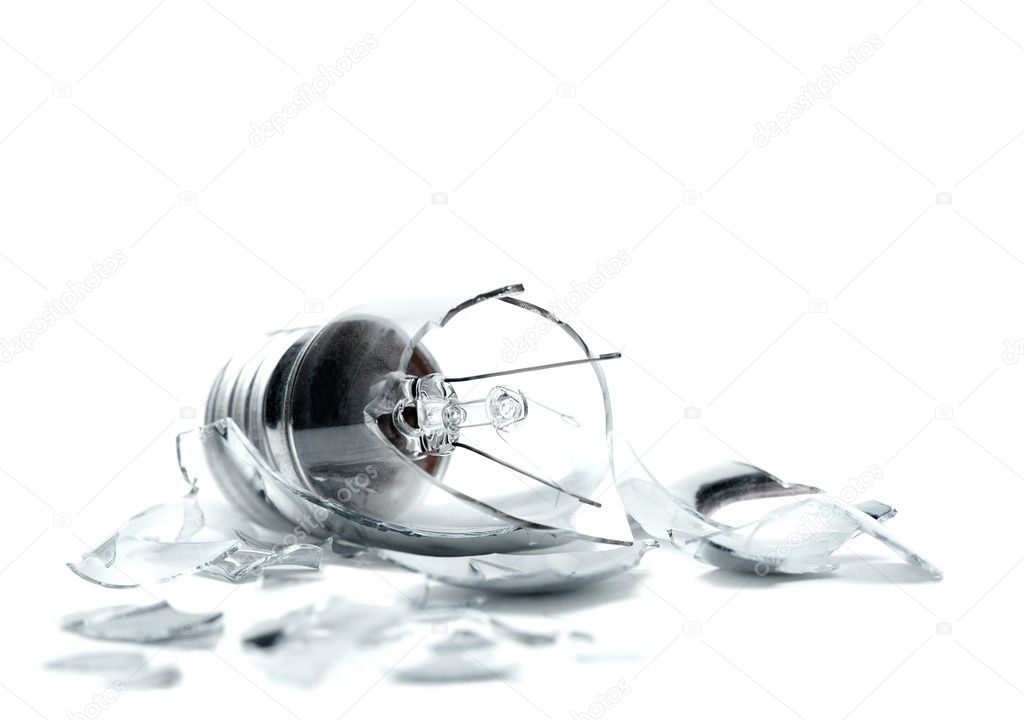 Broken lightbulb on white background