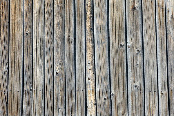 Old lumber texture of a wooden firewall