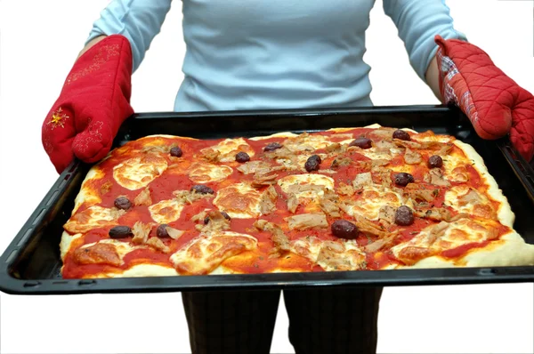 Mujer sosteniendo pizza Imagen de archivo