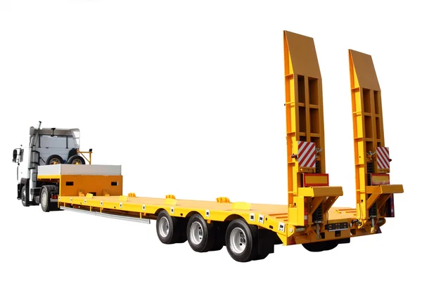 Traktor med en gul plattform — Stockfoto