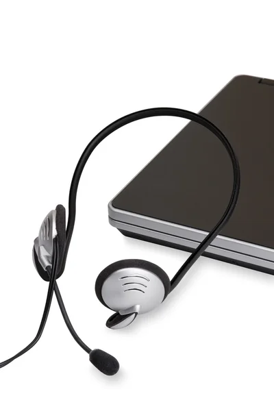 Headset and laptop — Stock Photo, Image