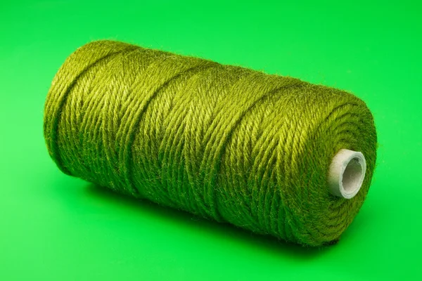 Bobbin of green thread — Stock Photo, Image
