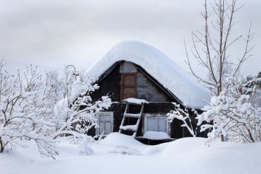 Russian house by winter clipart