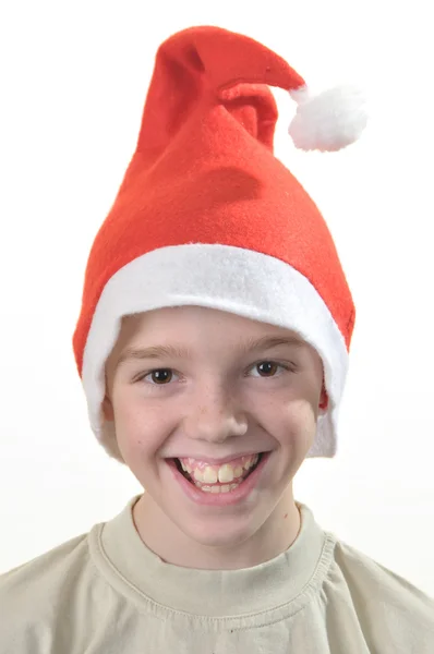 Rapaz feliz no chapéu do Pai Natal . — Fotografia de Stock