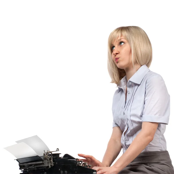 Femme d'affaires avec machine à écrire vintage sur blanc Images De Stock Libres De Droits