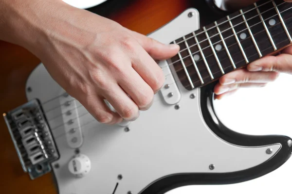Playing on electric guitar — Stock Photo, Image