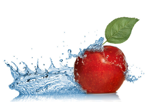 Red apple with leaf and water splash isolated on white