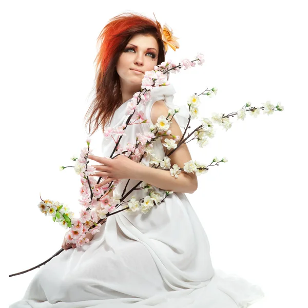 Portrait of beautiful woman with spring flowers on white — Stock Photo, Image