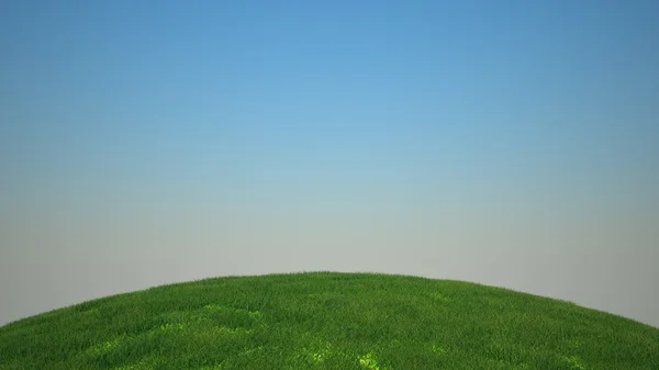 Зелена трава на пагорбі і блакитне небо — стокове фото