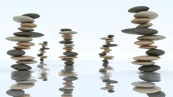 Stabilitet och harmoni. sten högar på vatten — Stockfoto