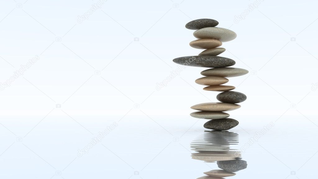 Stability concept. Pebble stack on water