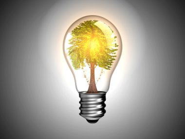 Lightbulb with tree inside it and light clipart