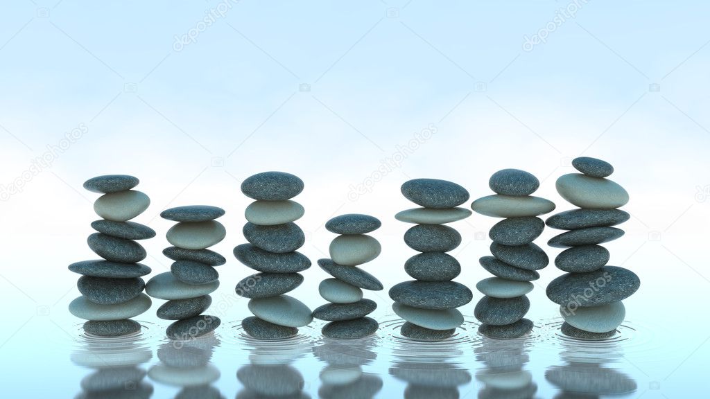 Seven Pebble stacks on water
