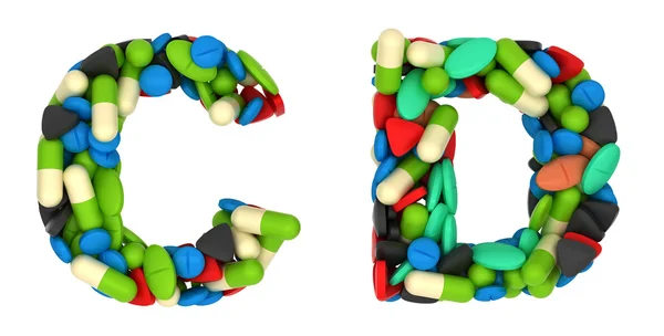 Fonte de cuidados de saúde C e D comprimidos letras — Fotografia de Stock
