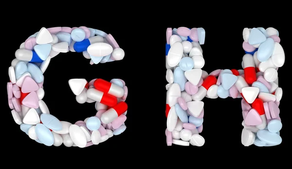 Medyczne czcionki g i h tabletki litery — Zdjęcie stockowe