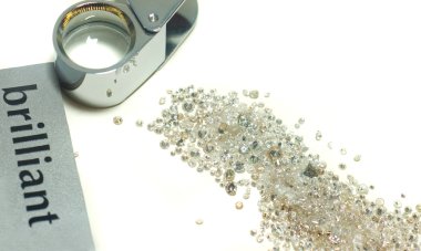 Sorting of gems - diamonds and loupe clipart