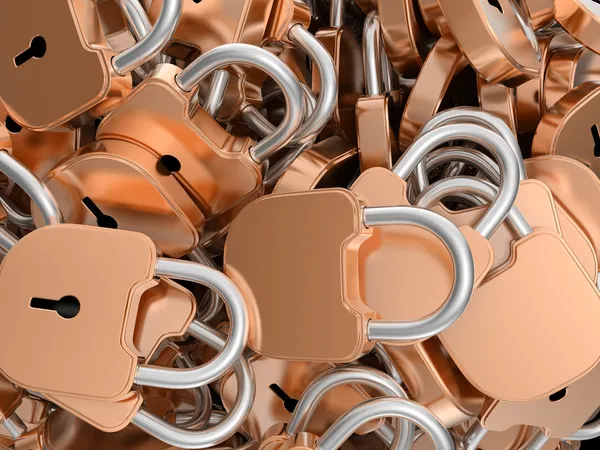 Close-up of locked brass padlocks — Stock Photo, Image