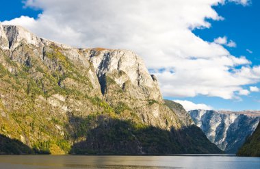 Norway nature: Mountains, fjord and blue sky clipart