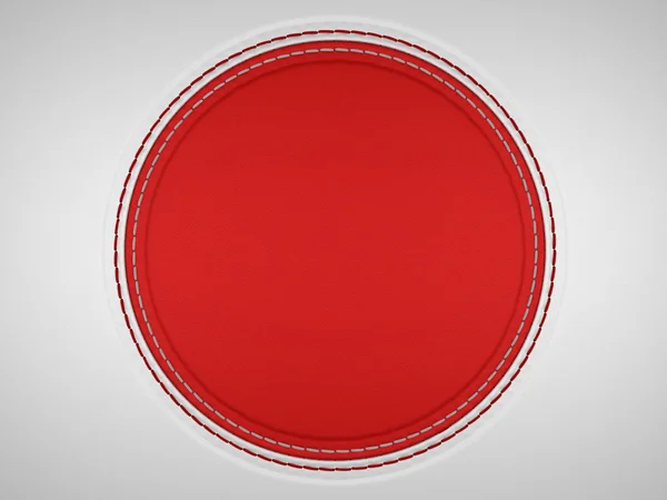Red and grey stitched circle shape on leather — Stock Photo, Image