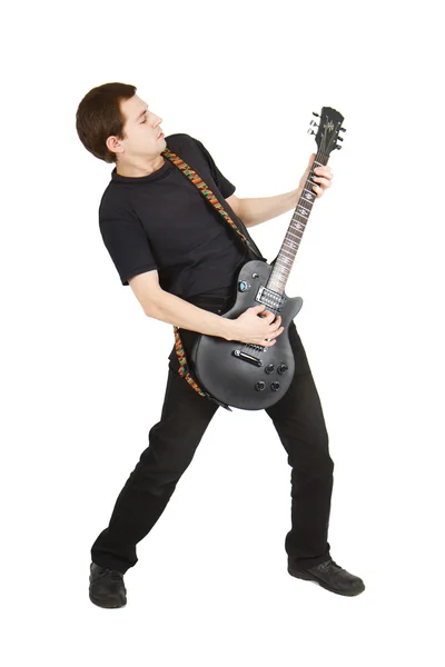 Młody człowiek z gitarą — Zdjęcie stockowe