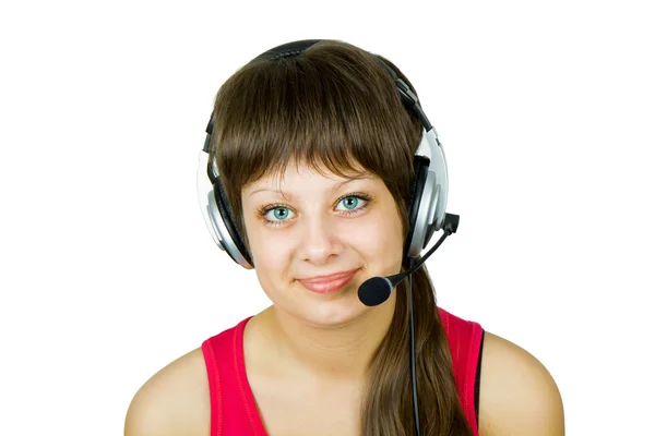 Chica sonriente en auriculares con micrófono — Foto de Stock
