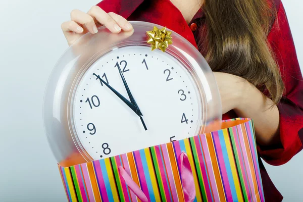 The girl with the clock — Stock Photo, Image