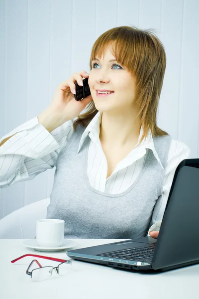 Happy business woman in the office — Stock Photo, Image
