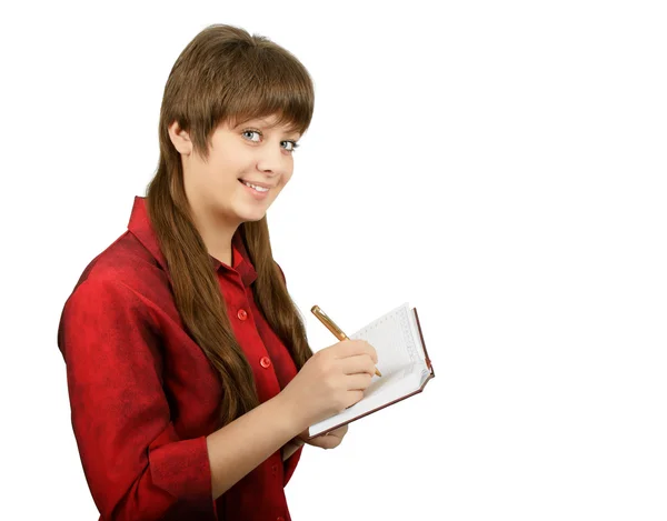 Χαμογελαστό κορίτσι με ένα σημειωματάριο — Φωτογραφία Αρχείου