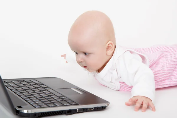 Infant with a computer — Stock Photo, Image